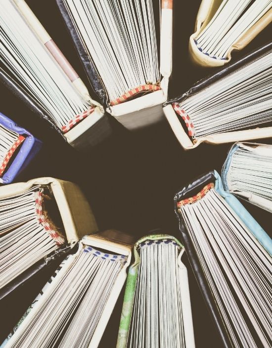 closeup of book binders arranged in a circle